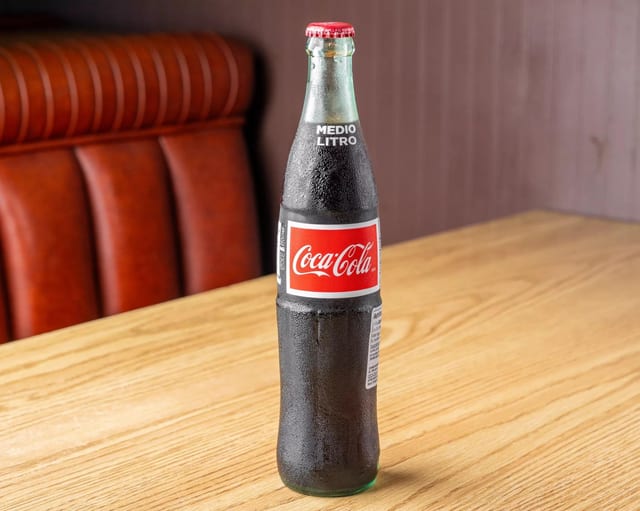 Coke Medio Litro botlle.